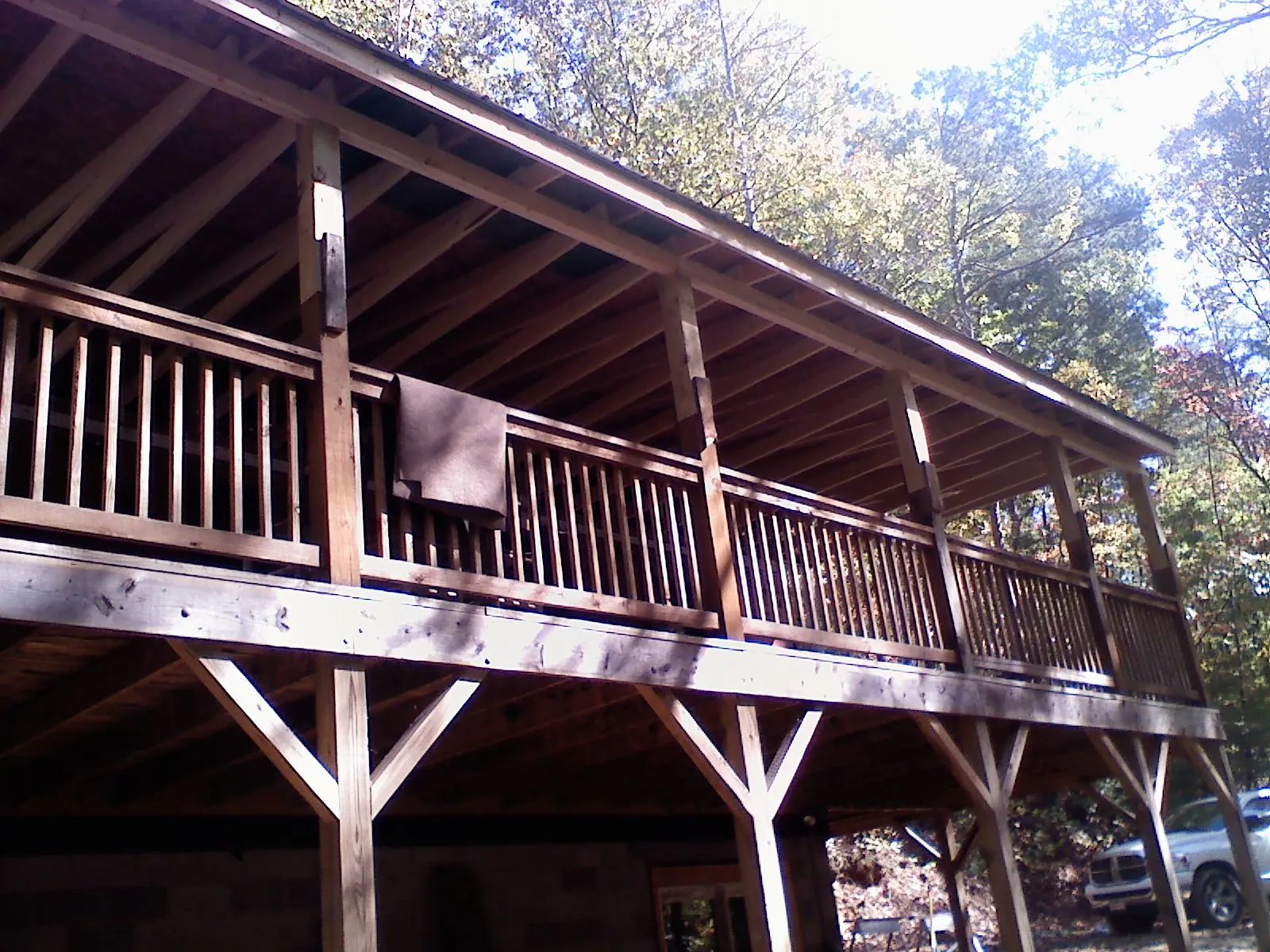 Timber framing under a new elevated porch and deck — Roof Leak Repair in San Angelo by Roofing Brothers